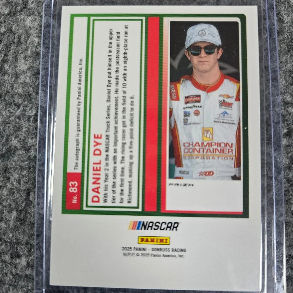 2025 Panini Donruss Racing Daniel Dye Orange Optic Prizm Autograph Card No 83 - Picture 2 of 2